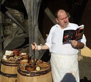 Stirling's Tudor Chef Sandy Easson reading my book